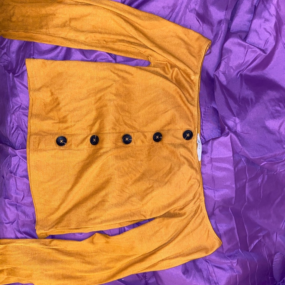 Buttoned up, off the shoulder long sleeve